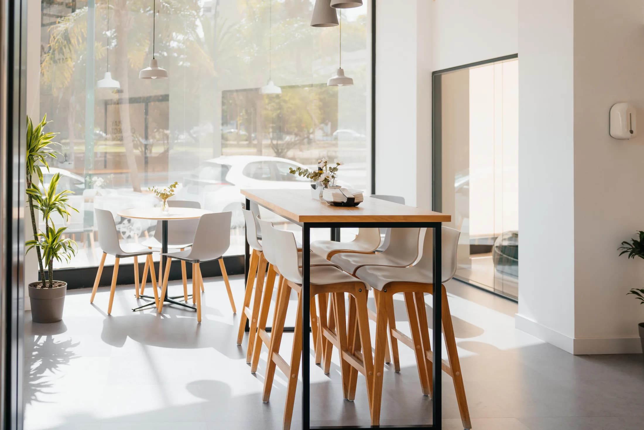 Bright canteen with a long shared table